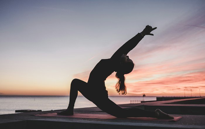 Woman in a restorative yoga pose